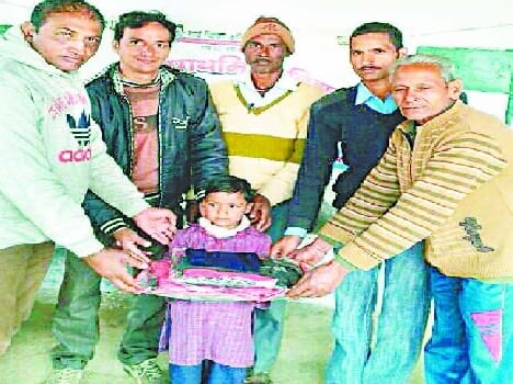 Dolki, track suits distributed to school children